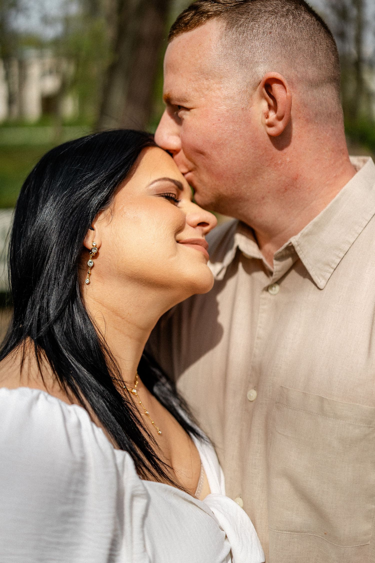A romantic couple shares intimate moments in a series of close-up photos outdoors.