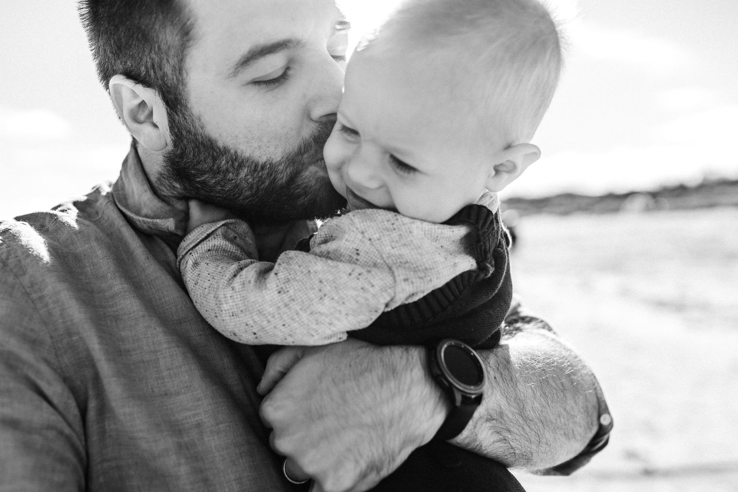 Tender black and white portrait showing gentle affection.