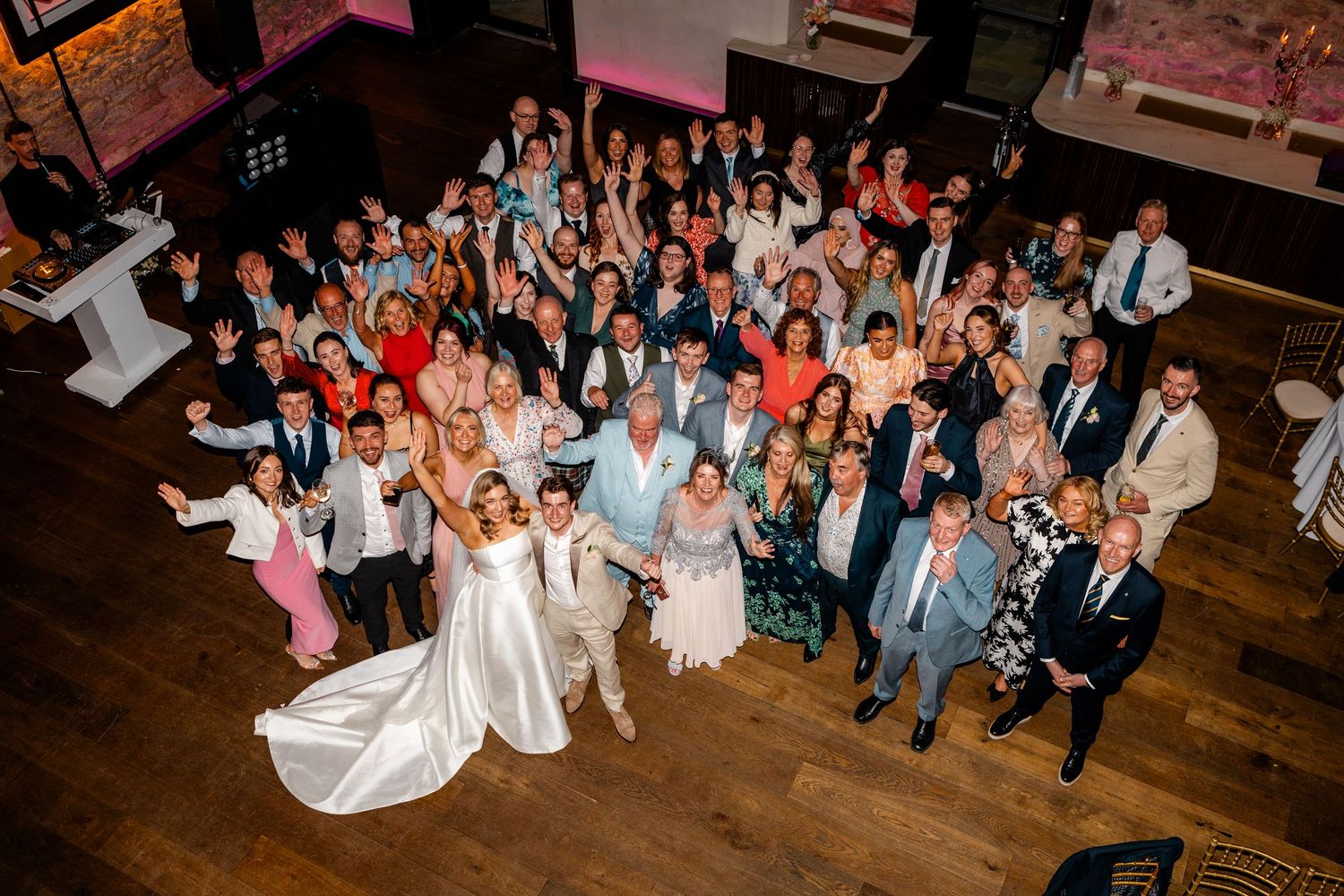 Wedding Group photo from balcony Virgin hotel in Edinburgh City Scotland