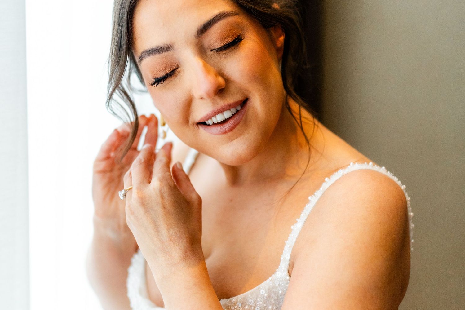 Bride putting earrings, getting ready, Glass House Edinburgh, Scotland,