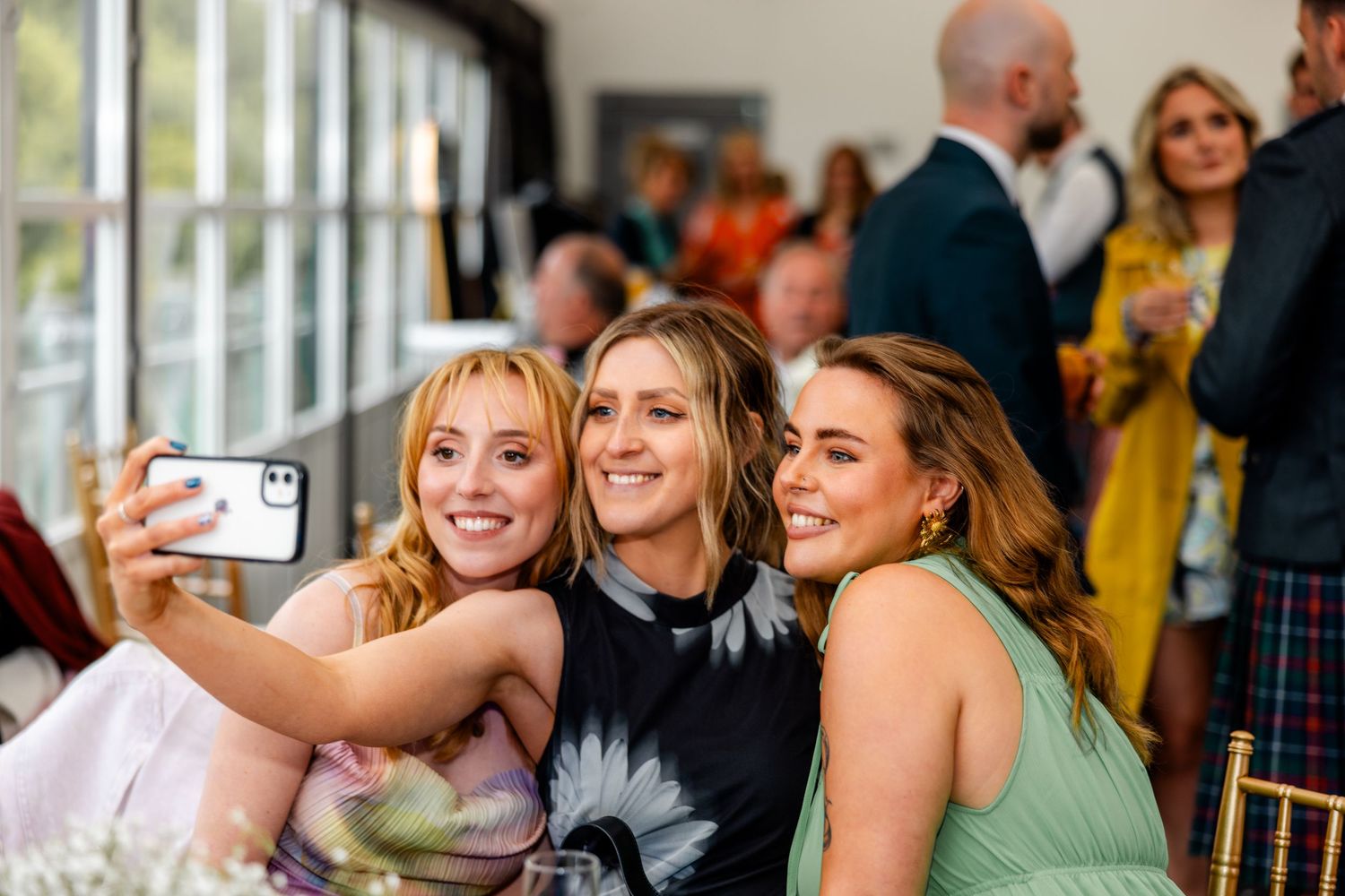 Guests having selfie,  wedding, Glass House Edinburgh City Scotland,