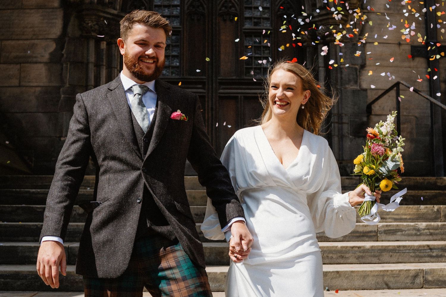 Confetti bride and groom Wedding photos Edinburgh Scotland