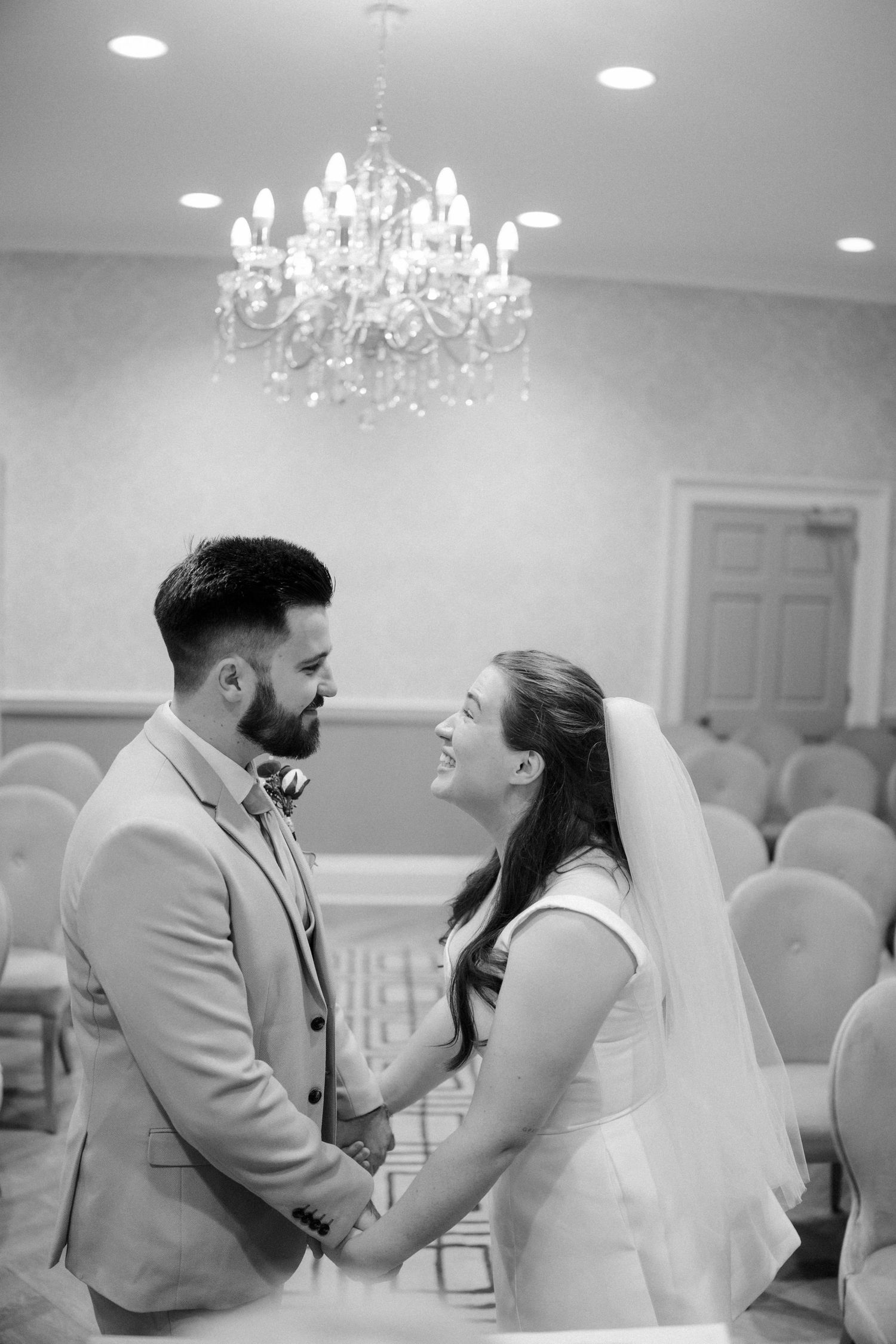 A romantic black and white photo sequence shows a couple sharing intimate moments during their wedding celebration.