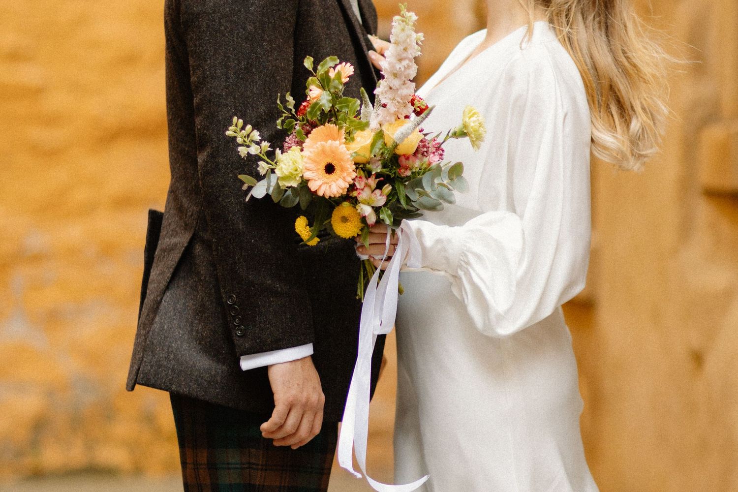 Wedding photos outside Riddles Court venue in Edinburgh