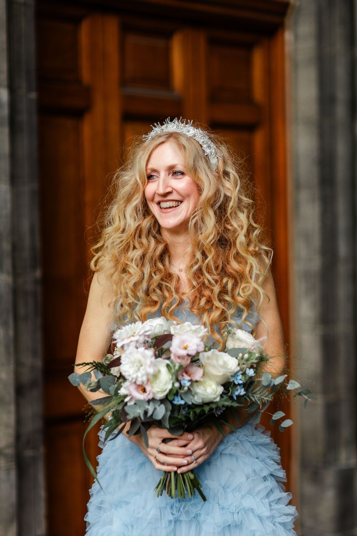 Bride with blue dress, unique great look wedding at City Chambers Edinburgh Scotland,