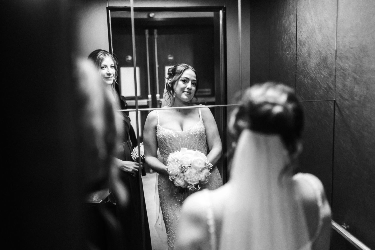 Sister and bride inside Glass House Edinburgh, black and white picture