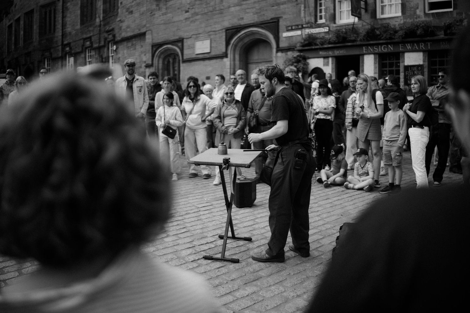 Black and White Wedding photos with Edinburgh Fringe on Vittoria Street in Edinburgh Scotland