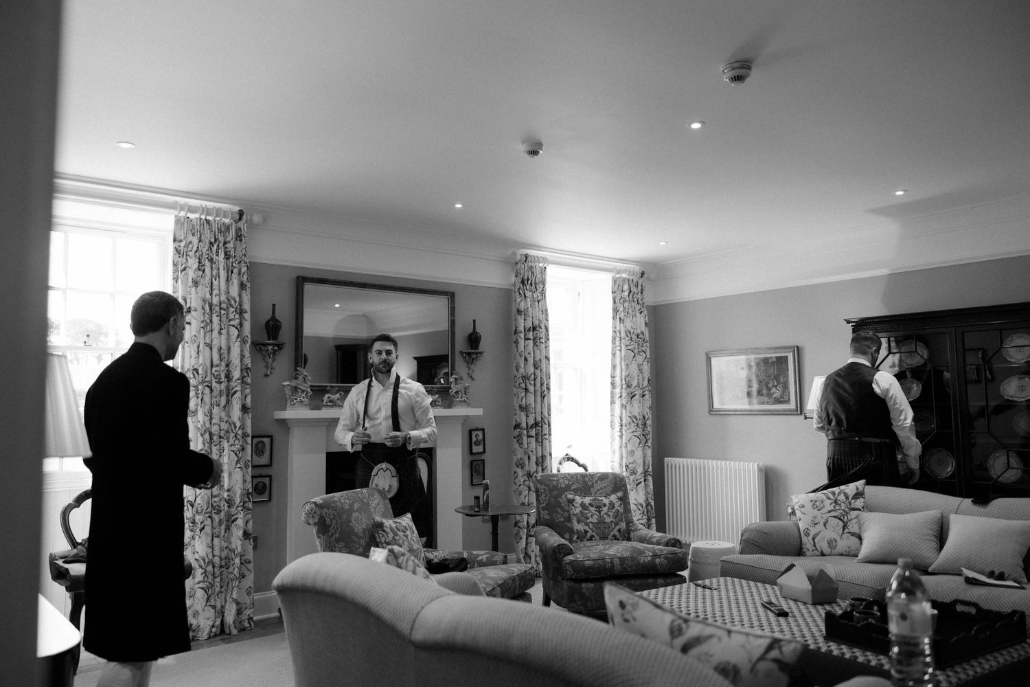 Groom getting ready at Rosebery Steading, Temple, Gorebridge, Scotland.
