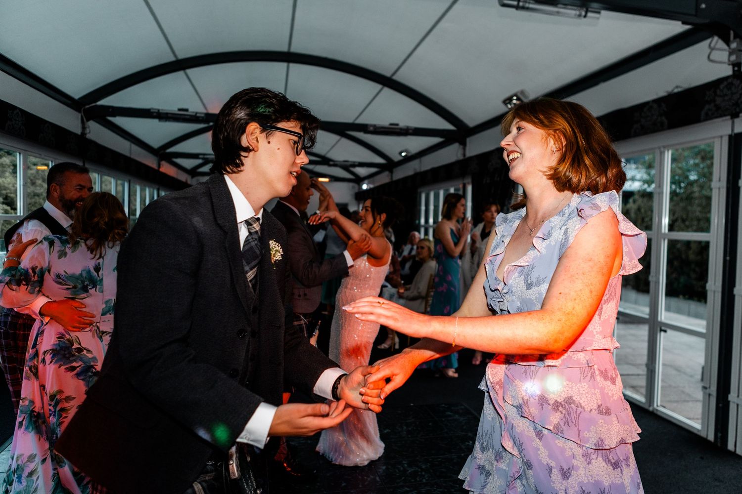 Guests having fun, dancing wedding, Glass House Edinburgh City Scotland,