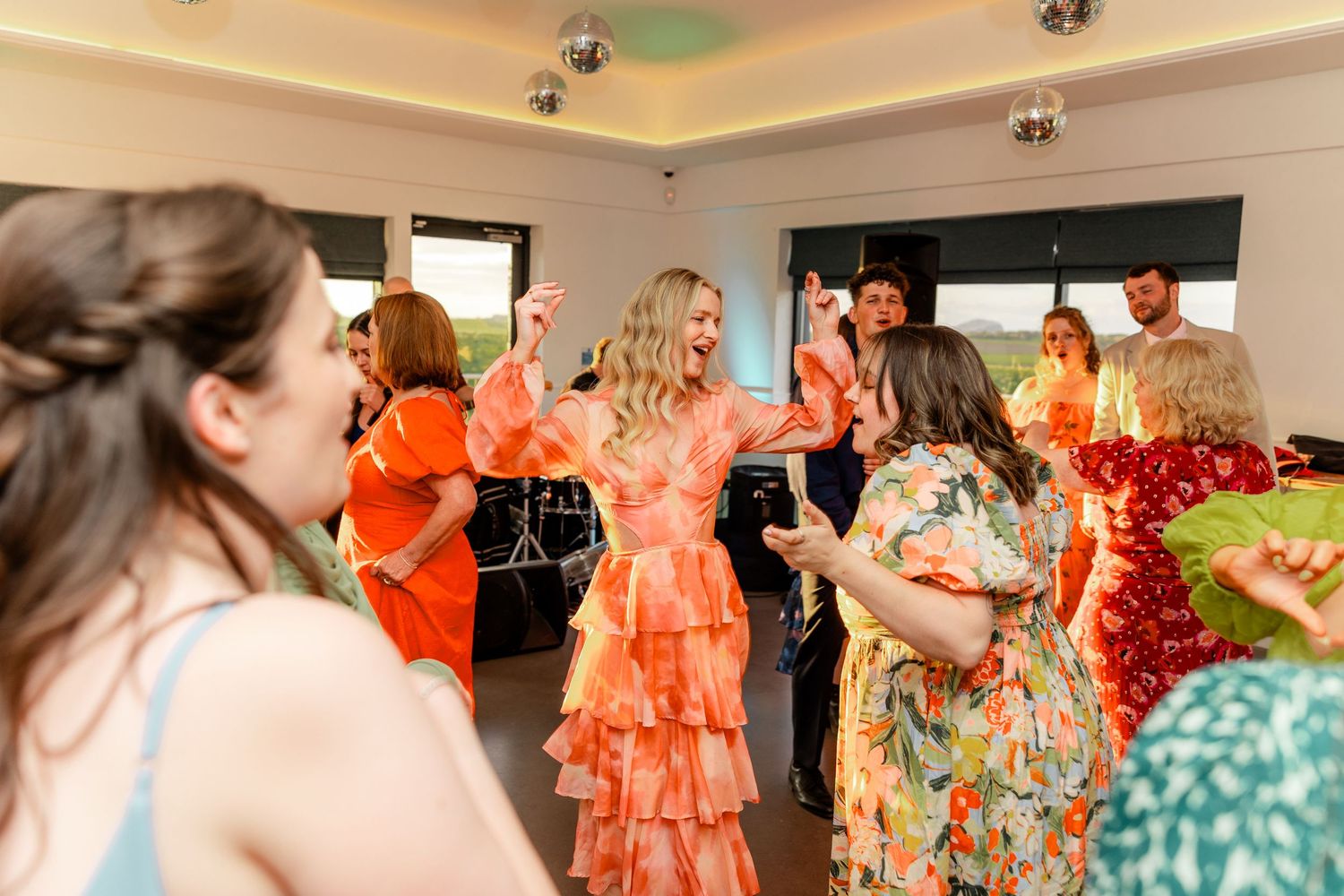 Wedding guest dancing, Whitekirk Hill, Whitekirk, North Berwick