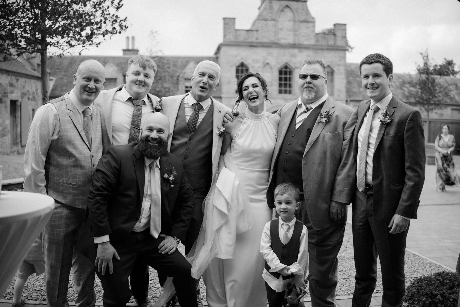 Wedding group portraits courtyard at Rosebery Steading, Temple, Gorebridge, Scotland.
