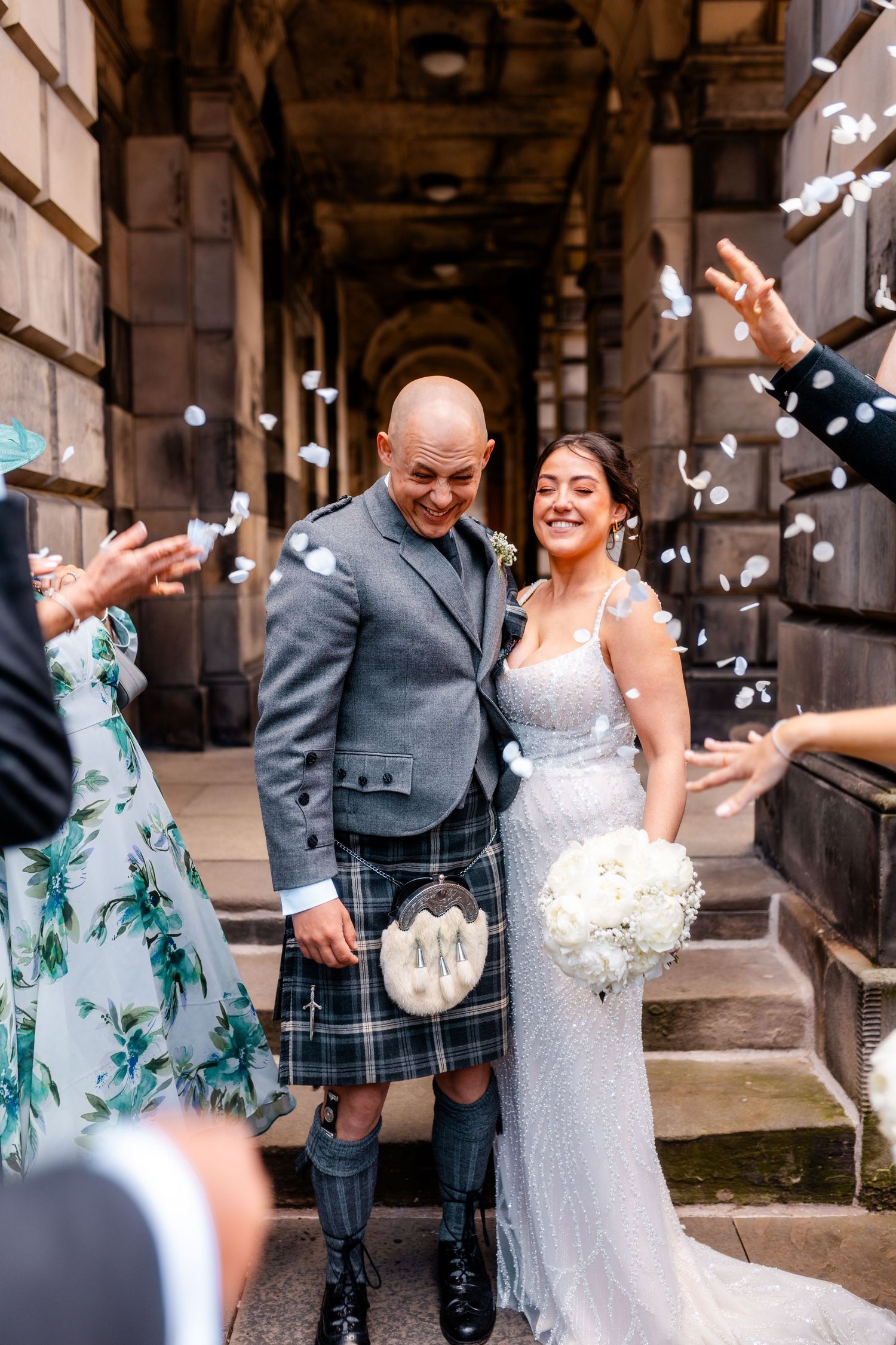 Bride and groom, confetti, City Chambers wedding in Edinburgh, Scotland,