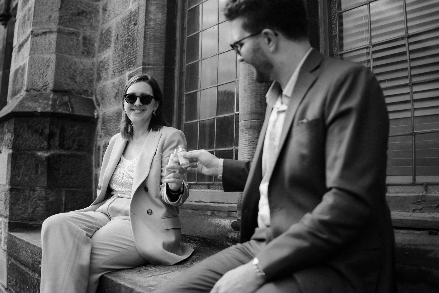 Wedding celebration over a whiskey in pub in Edinburgh Scotland