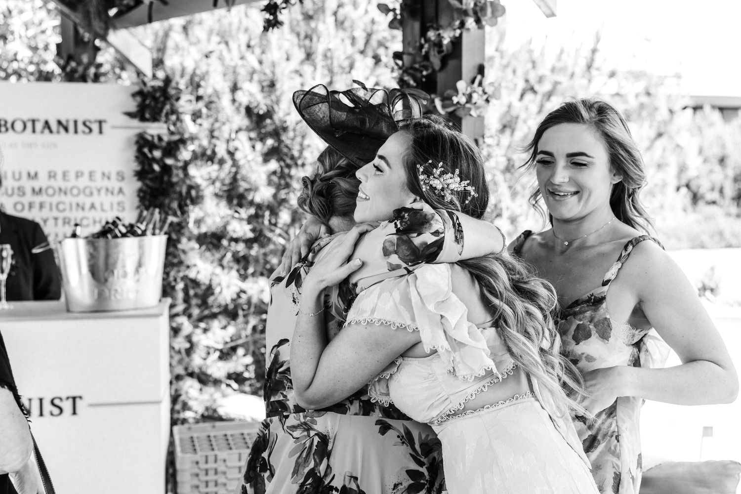 Guests hugging outside of Glass House Edinburgh, Scotland.