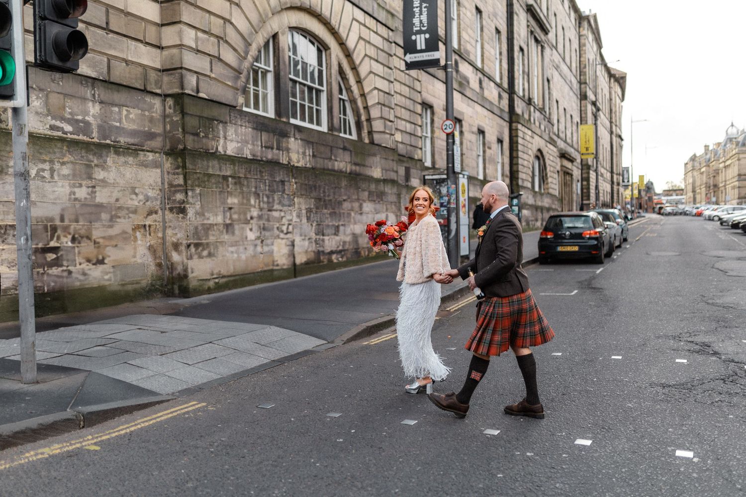 Stone buildings and cobblestone streets create a romantic atmosphere in Edinburgh's historic Royal Mile.