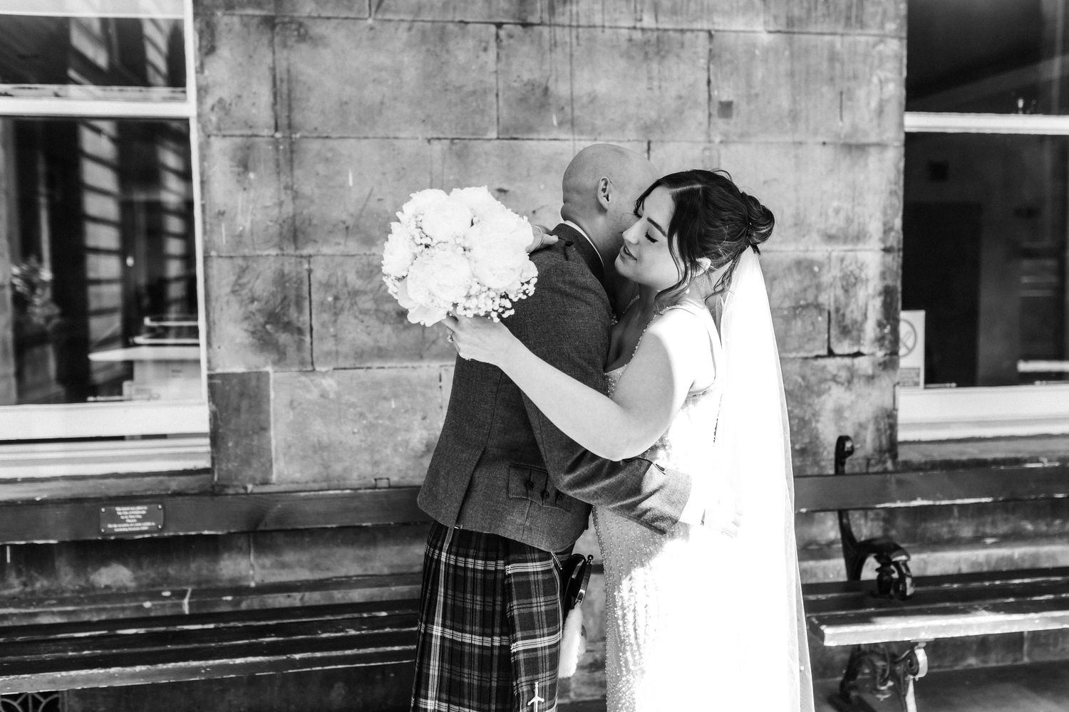 Bride and groom first  look outside City Chambers wedding in Edinburgh, Scotland,