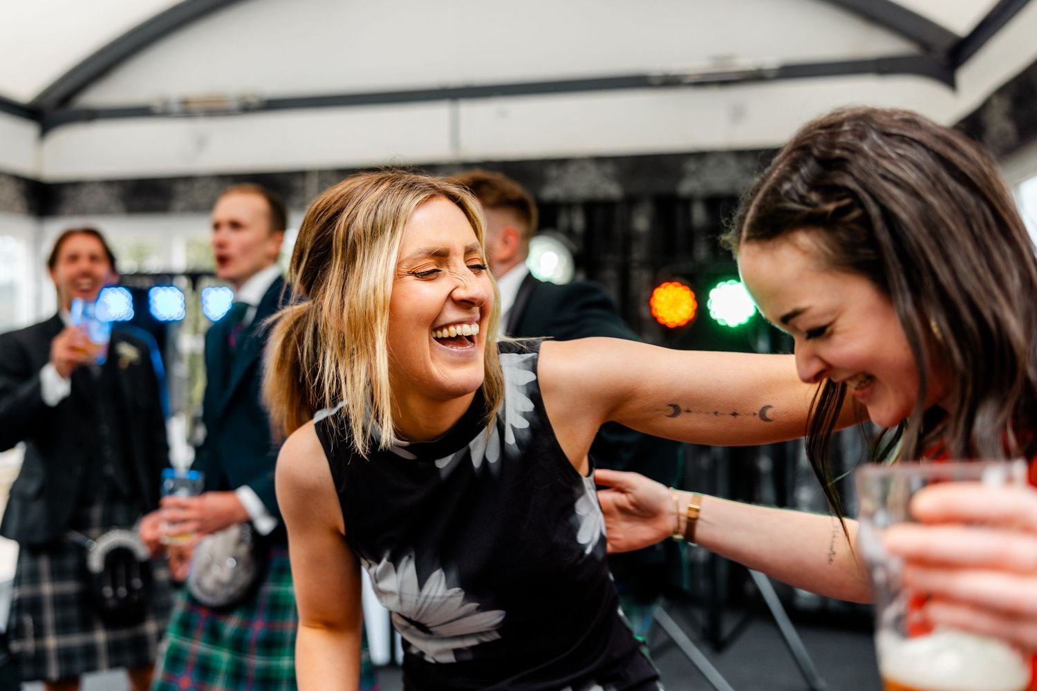 Guests having fun, dancing, talking, wedding, Glass House Edinburgh City Scotland,