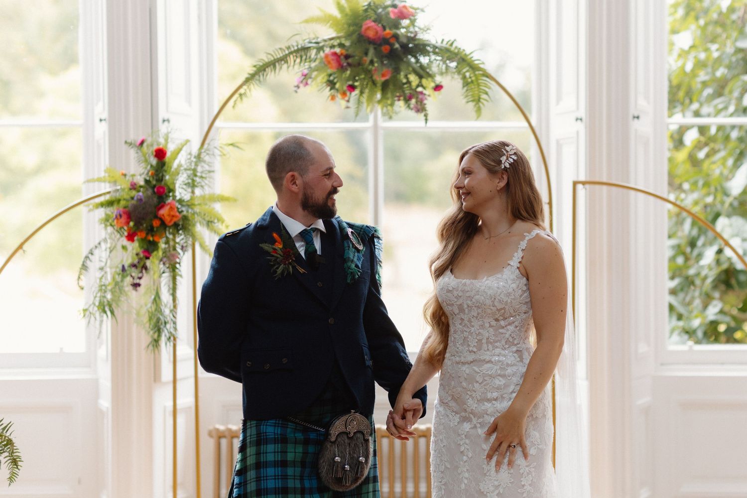 Just married, bride and groom looking at each other, Netherbyres House
Wedding venue in Eyemouth, Scotland
