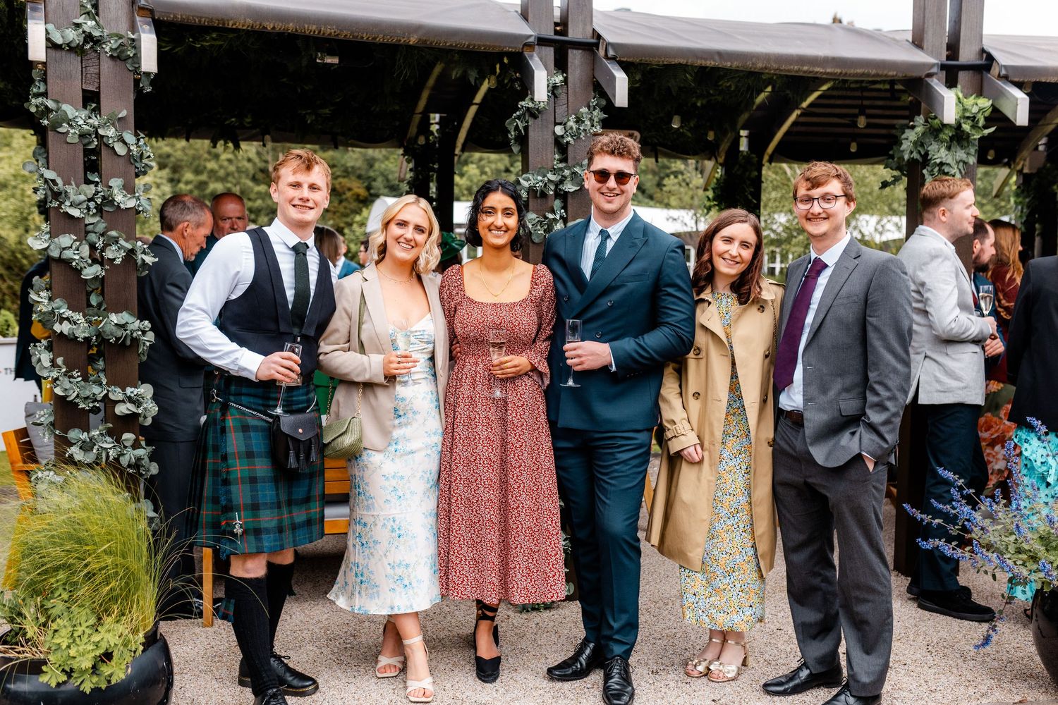 Family together wedding outside of the Glass House, Edinburgh, Scotland.