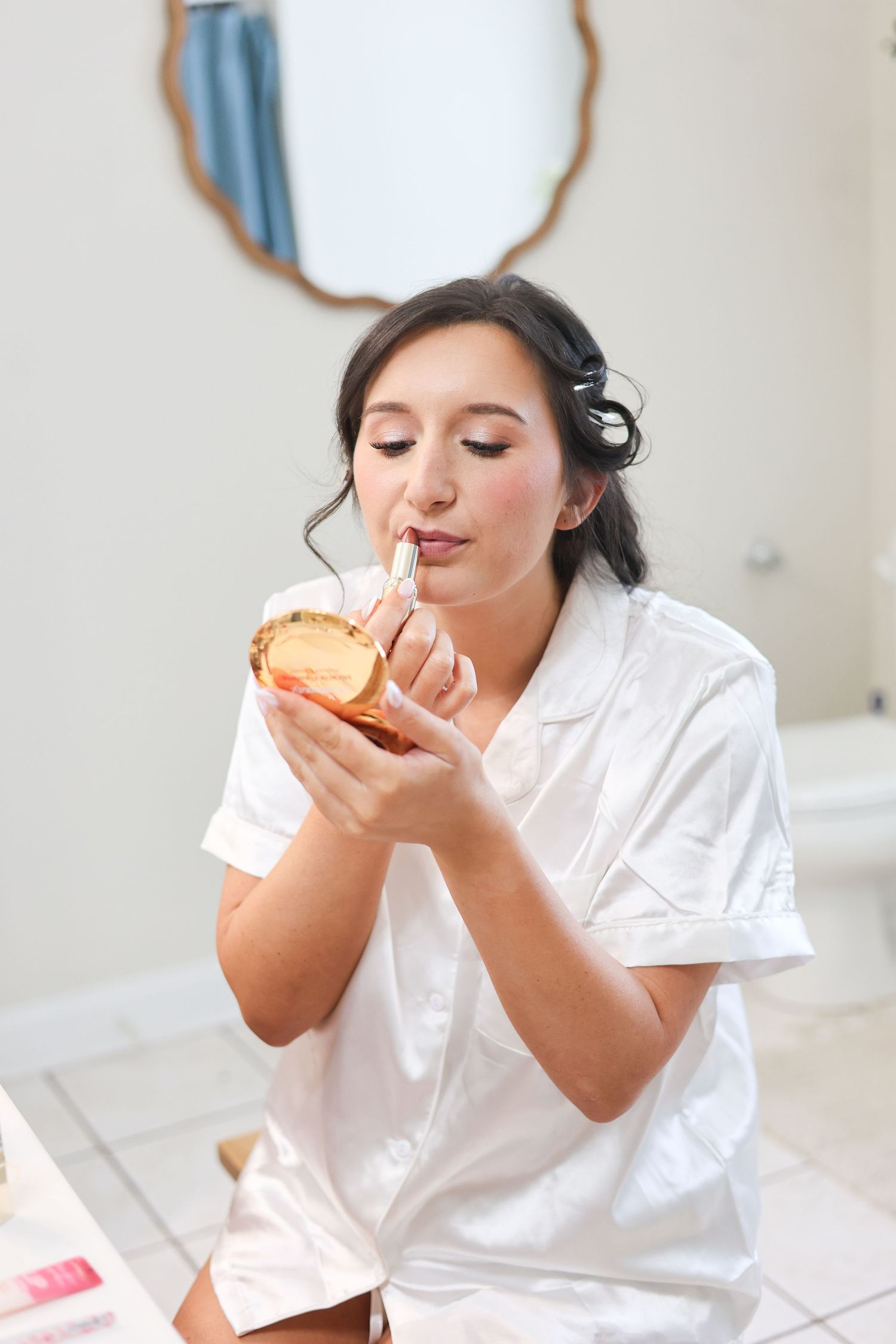 A series of photos showing someone in a white shirt enjoying and savoring a slice of pizza.