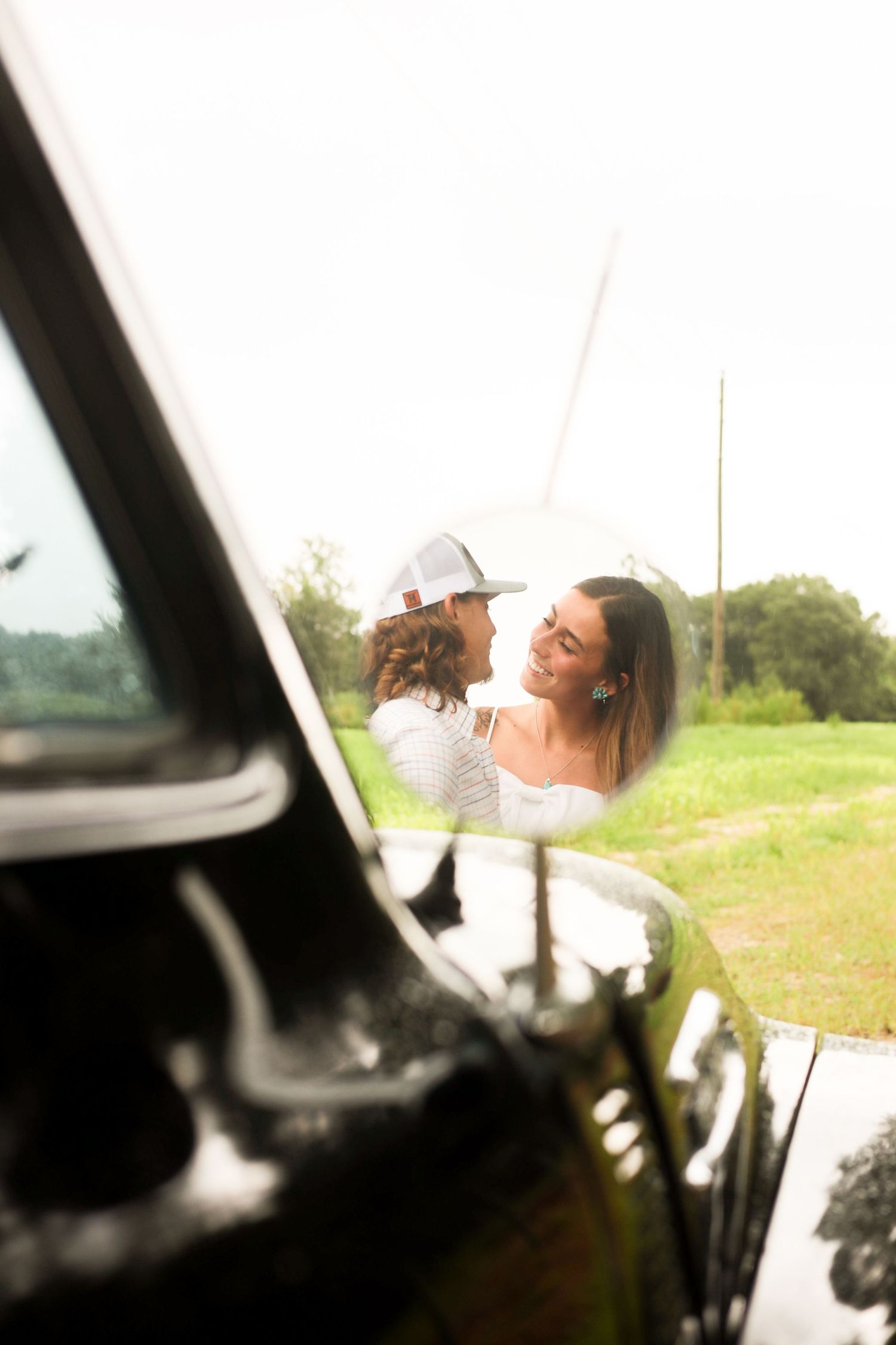 Natural sunlight streams through a car window creating a dreamy atmospheric scene.