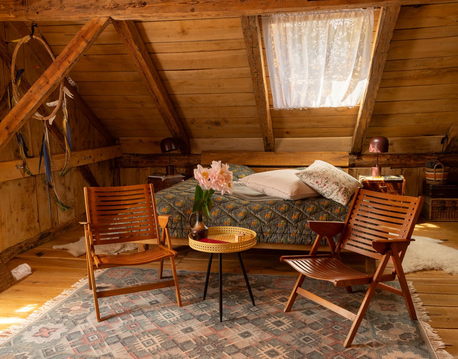Rustic wooden cabin interior with cozy seating area and warm lighting creating an inviting atmosphere.