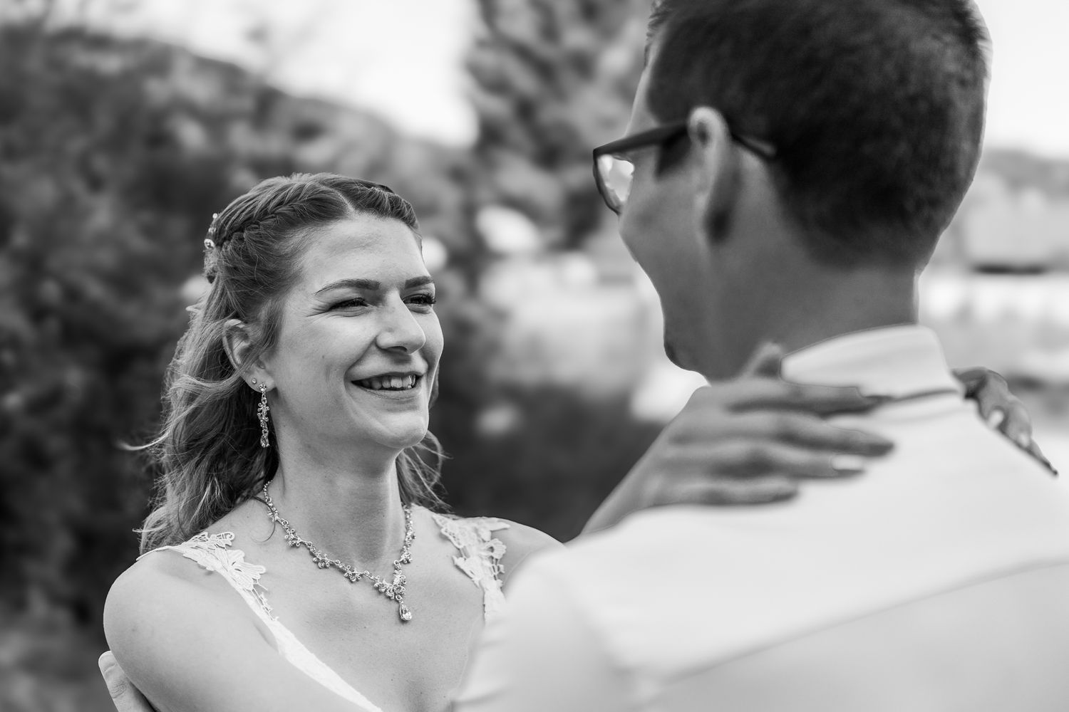 Black and white candid wedding moments captured in sequence.