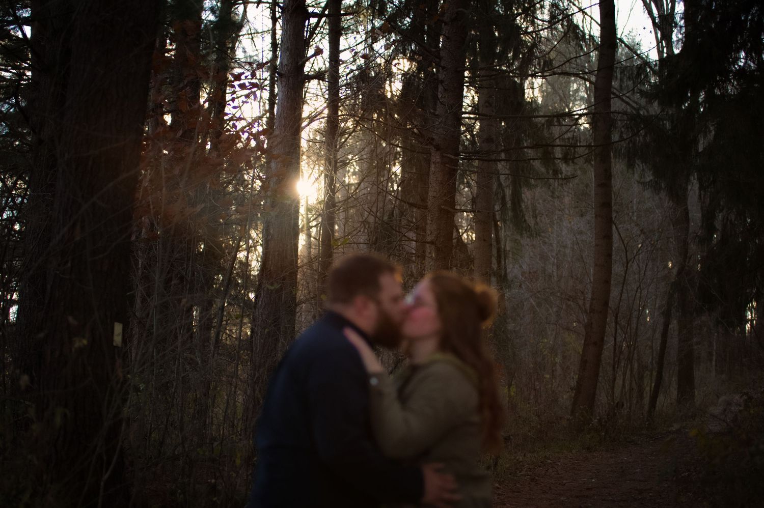 Engagement photo in the woods