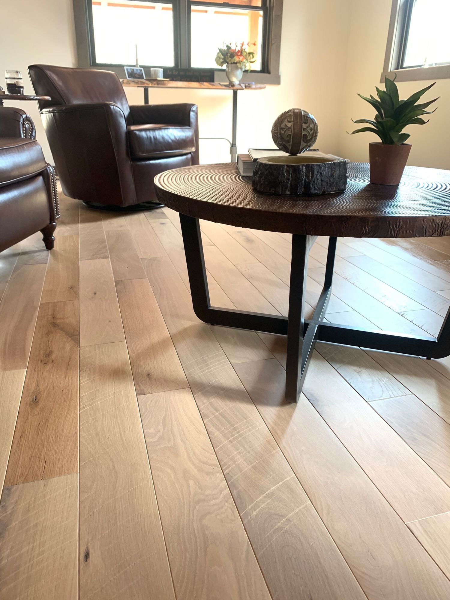 Living room photo by A-List Marketing Services showcasing a new wood floor.