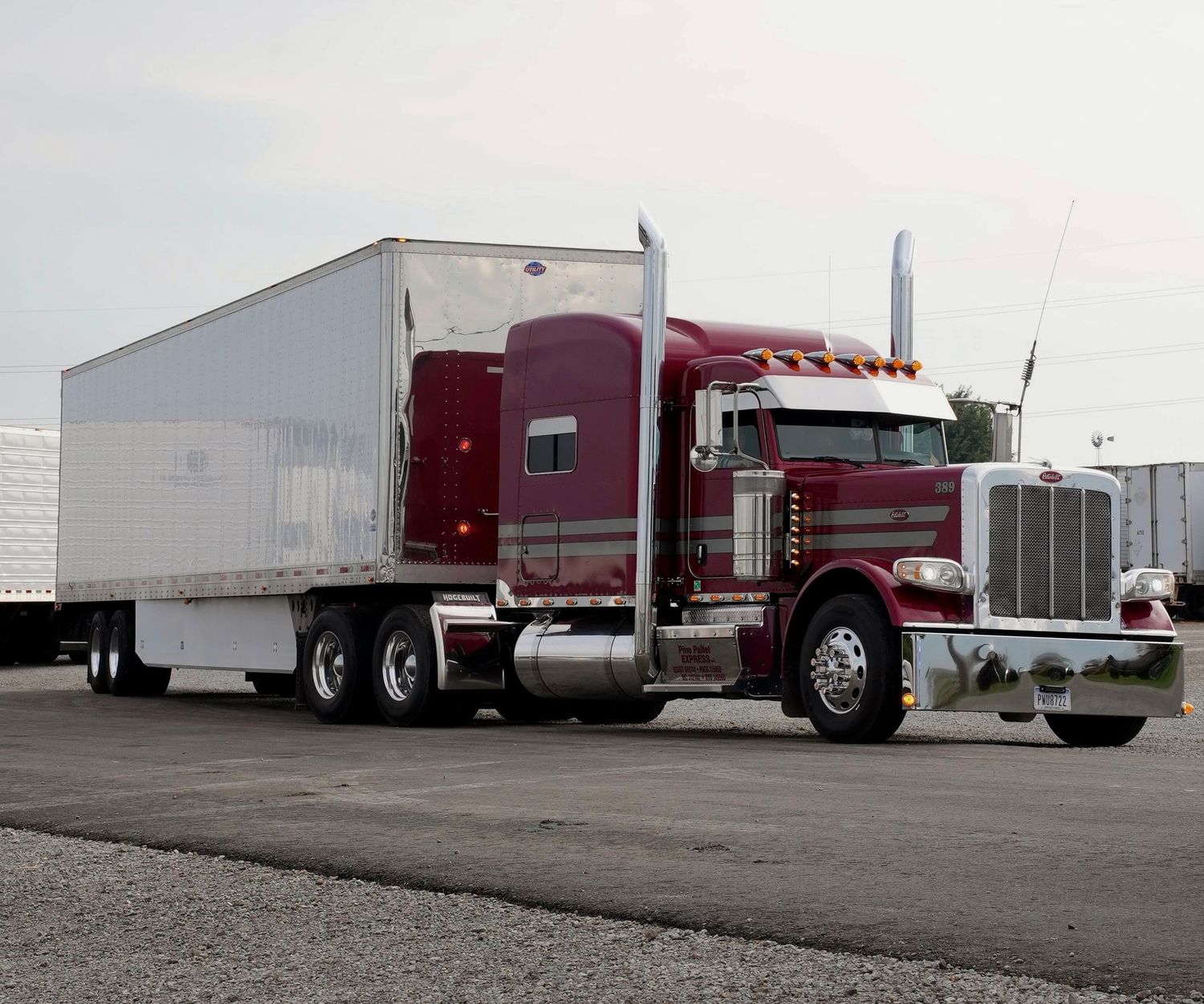 A Peterbilt with a van trailer