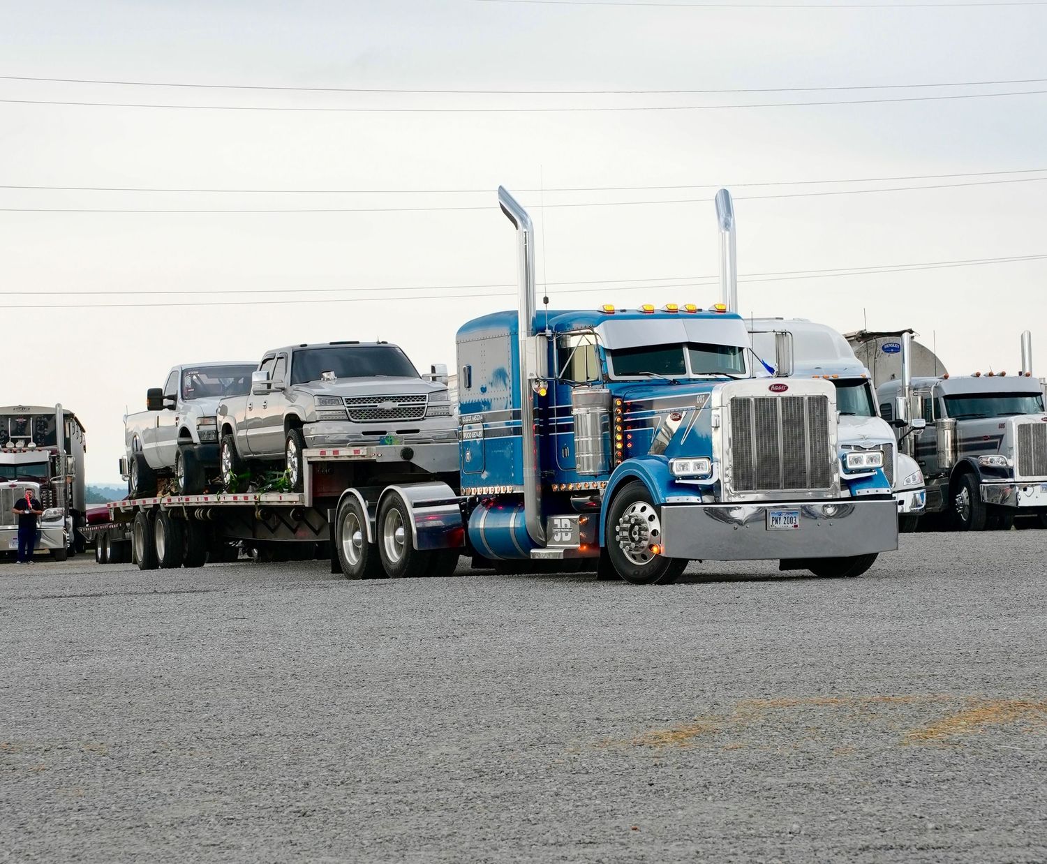 A Peterbilt hauling trucks