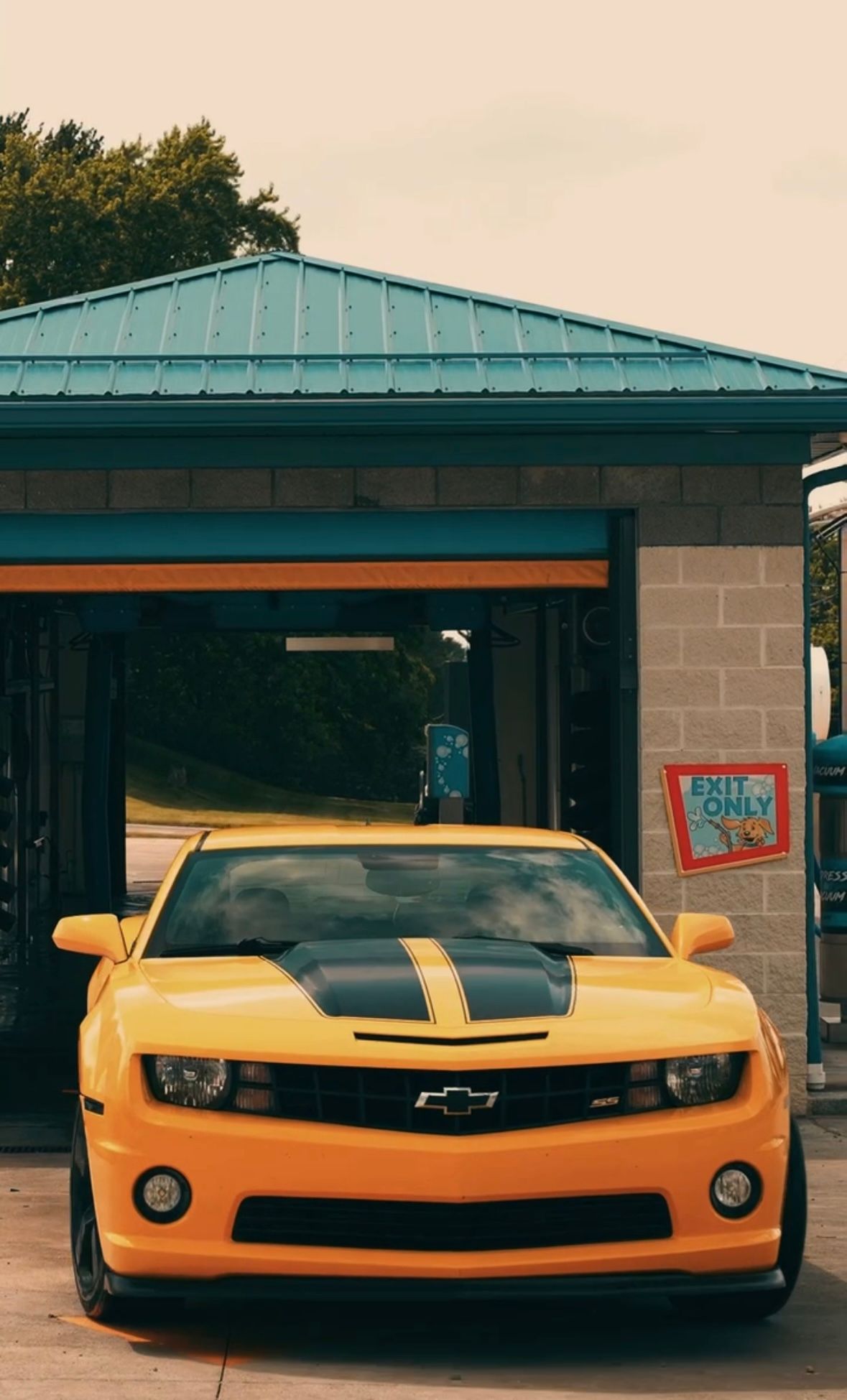 A yellow Camaro