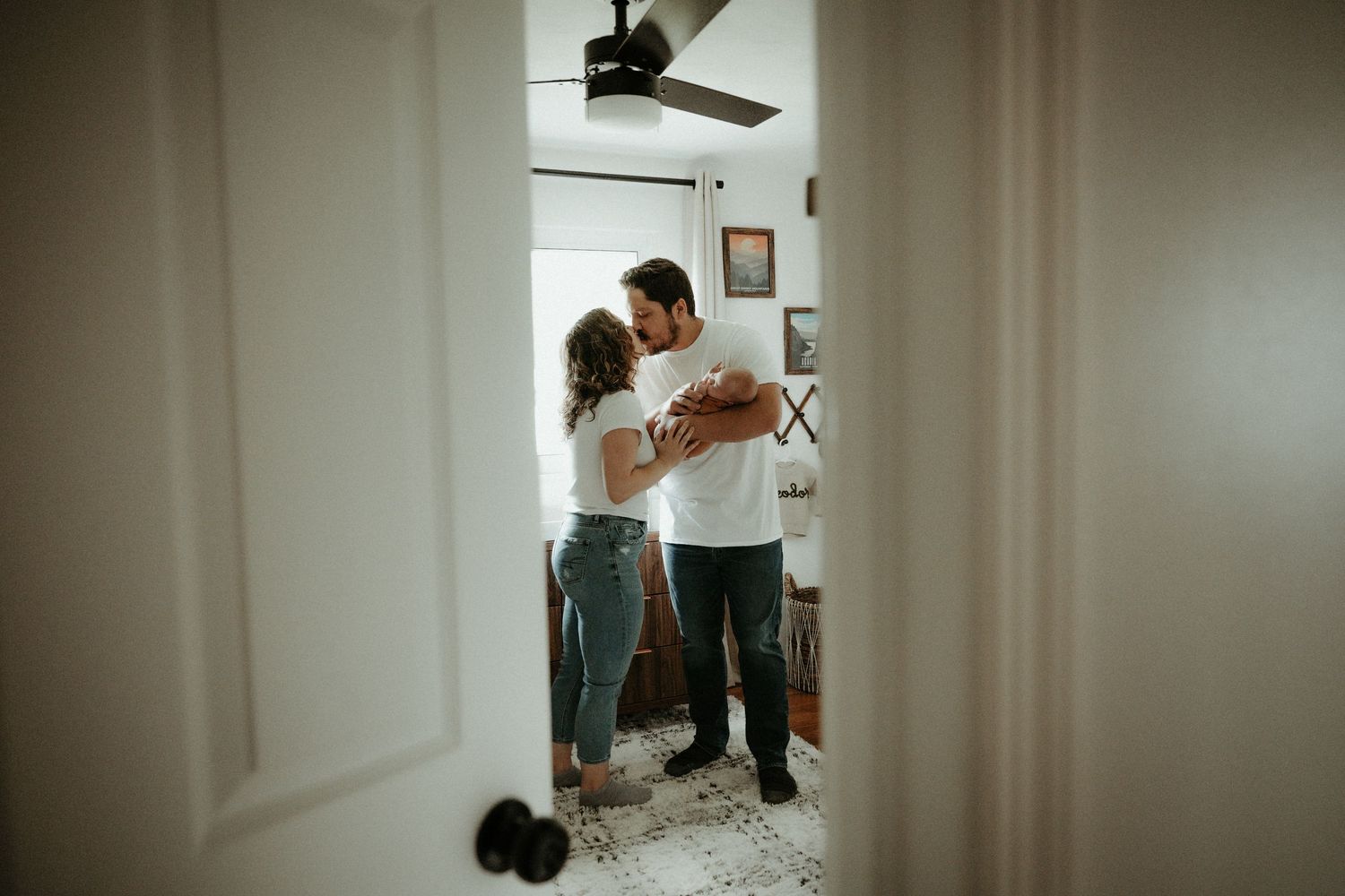 A person wearing a white t-shirt embraces another in their arms. Pittsburgh / Westmoreland Photographer