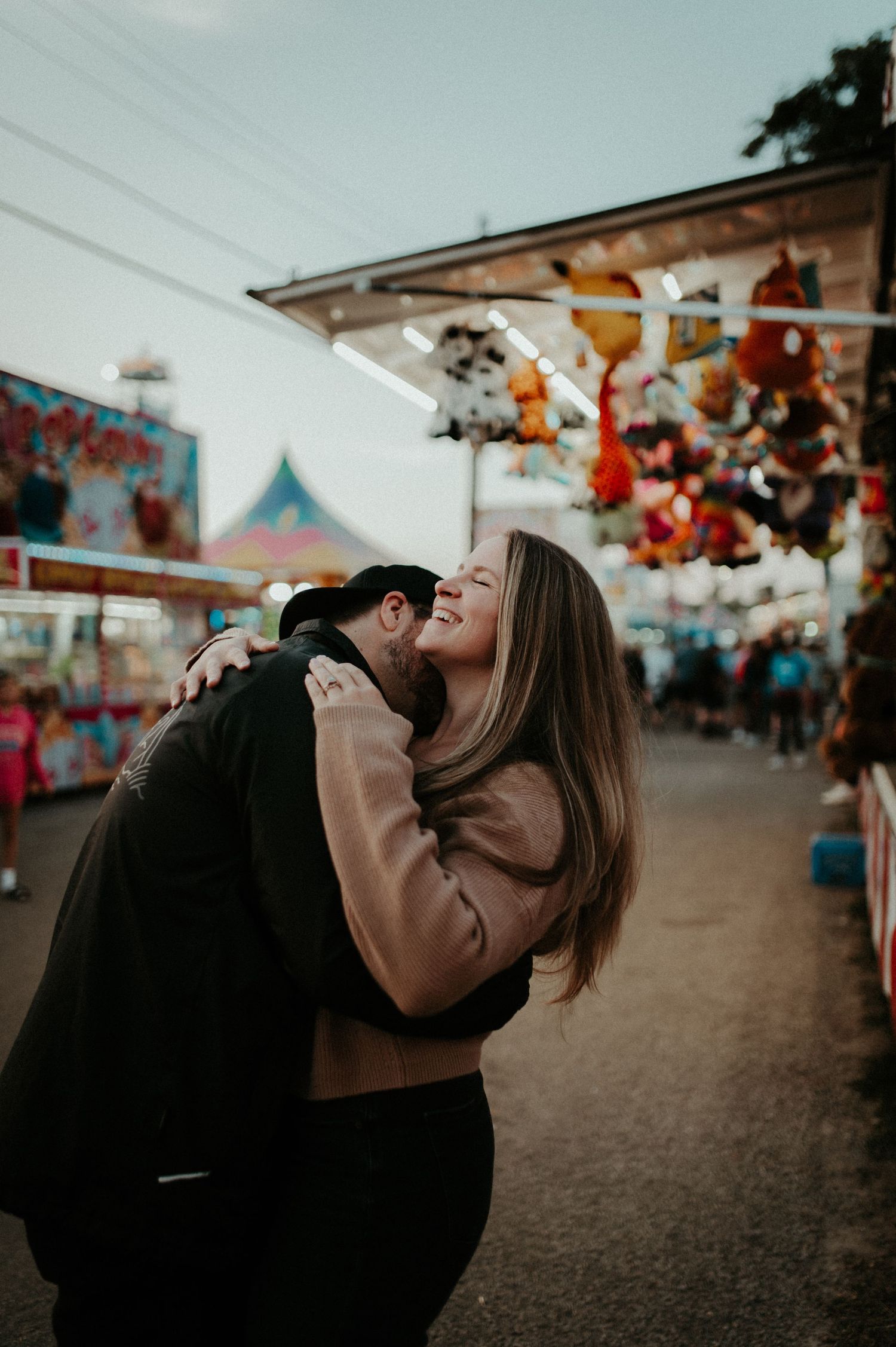 Couple at a carnival photographed by Greensburg photographer