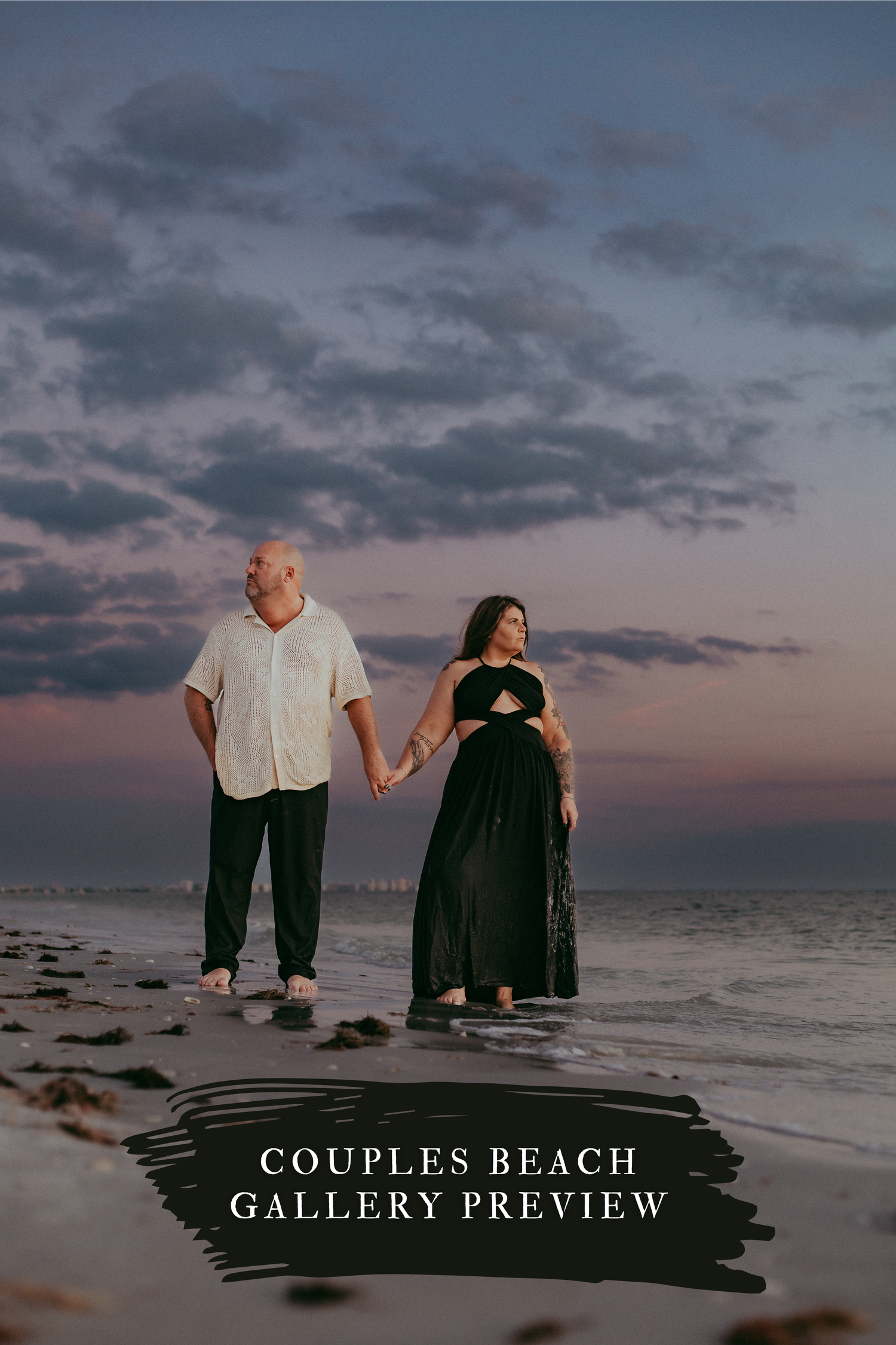 Couple sitting together on a wooden deck at the beach during sunset with moody cloudy skies.