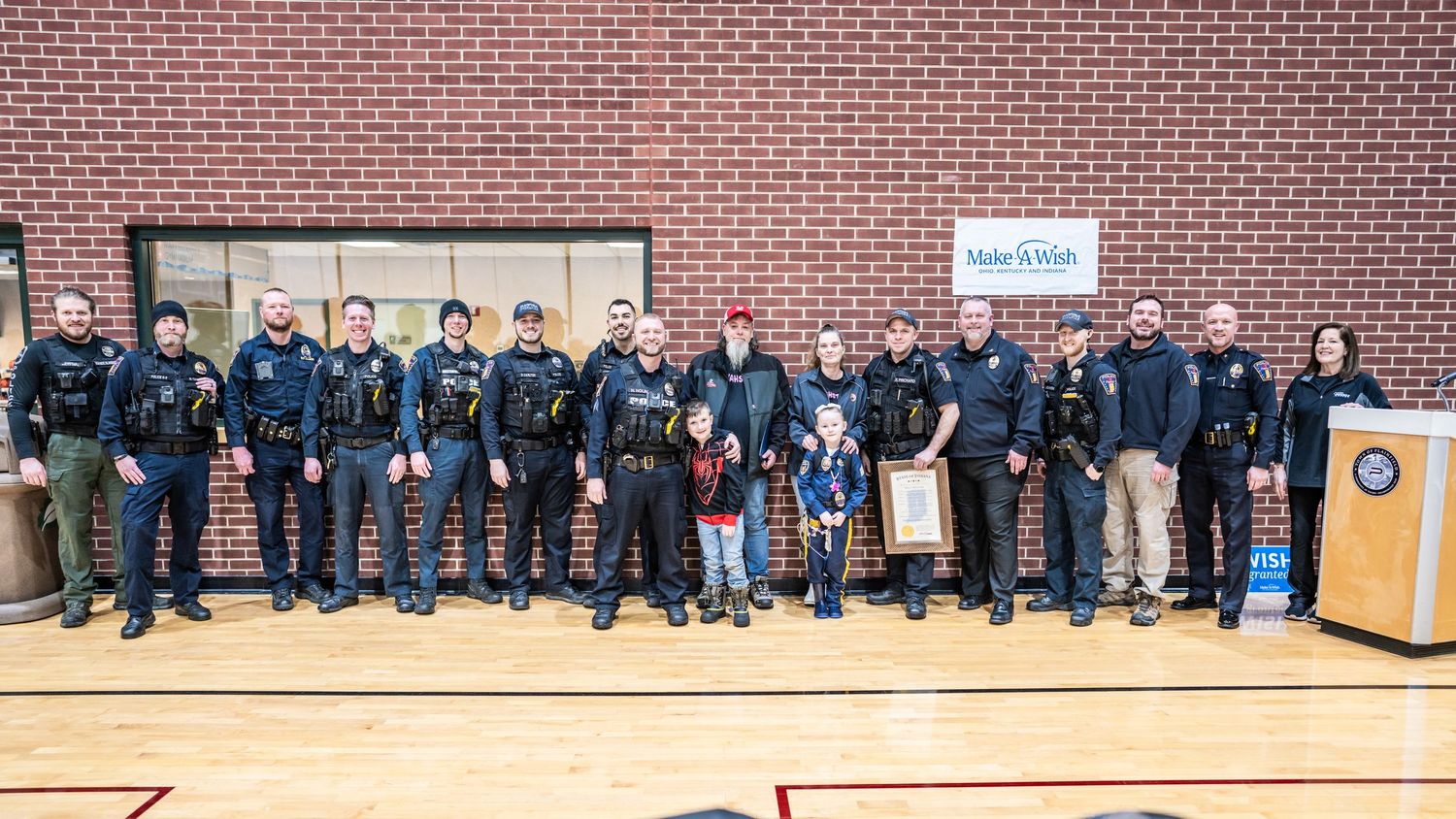 Officer Elayah for a day final ceremony with the Plainfield Police Department