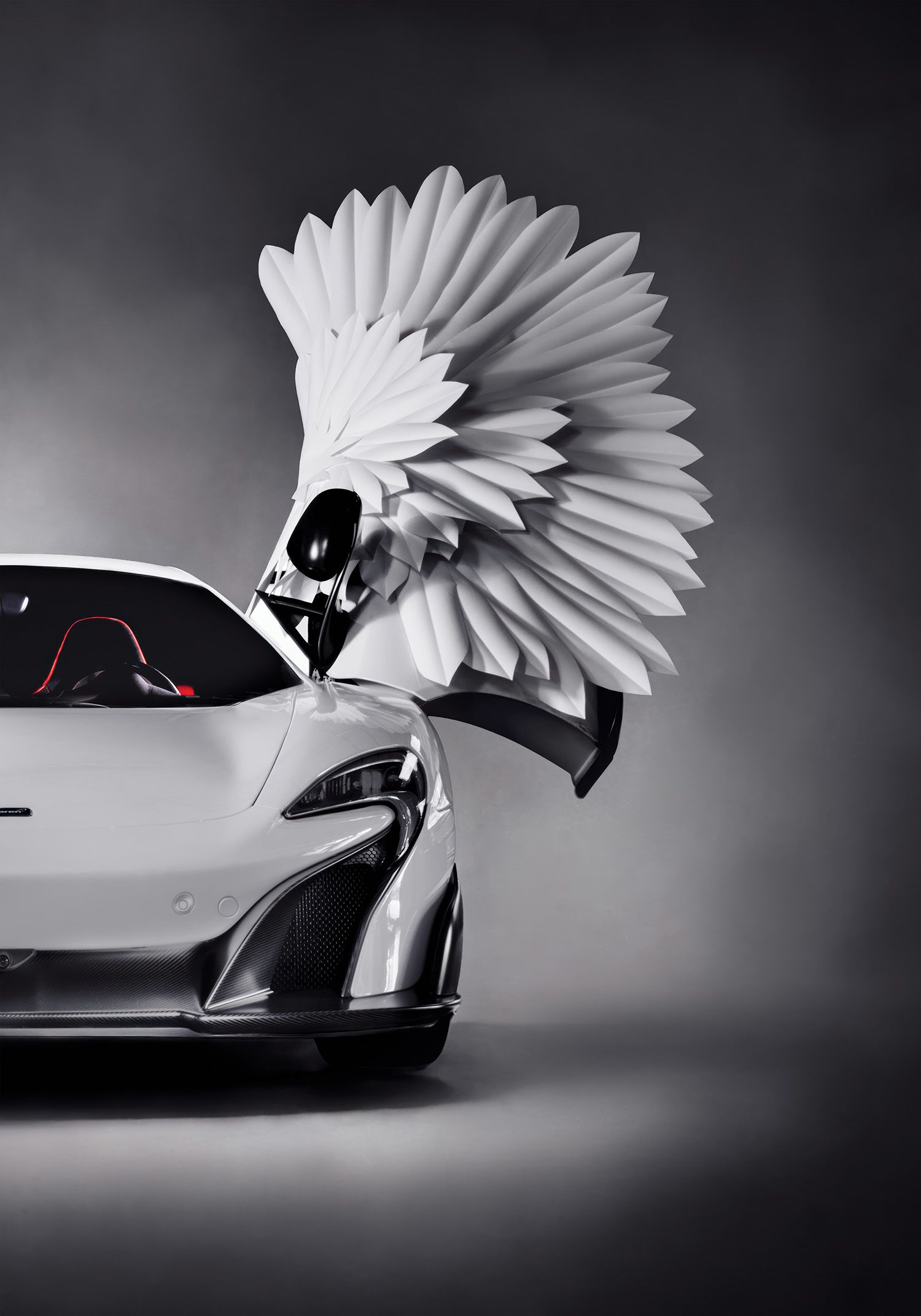 McLaren swan wings art paper sculpture