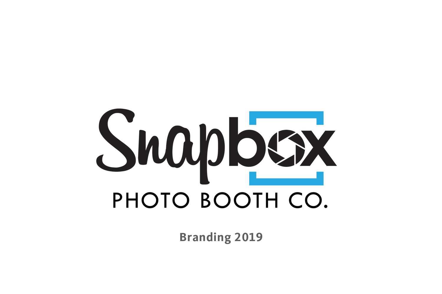 Snapbox Photo Booth Co. branding logo 2019 featuring a camera aperture icon and blue bracket design.