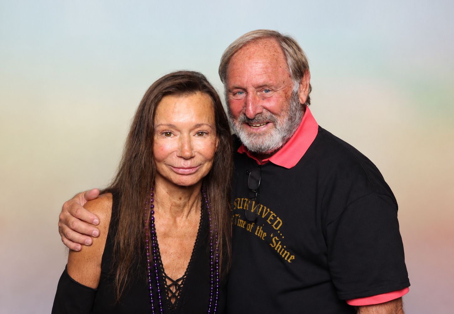 An older couple smiling together at the Sunshine Saloon in Pleasanton. This is Bob and Heather Rossi