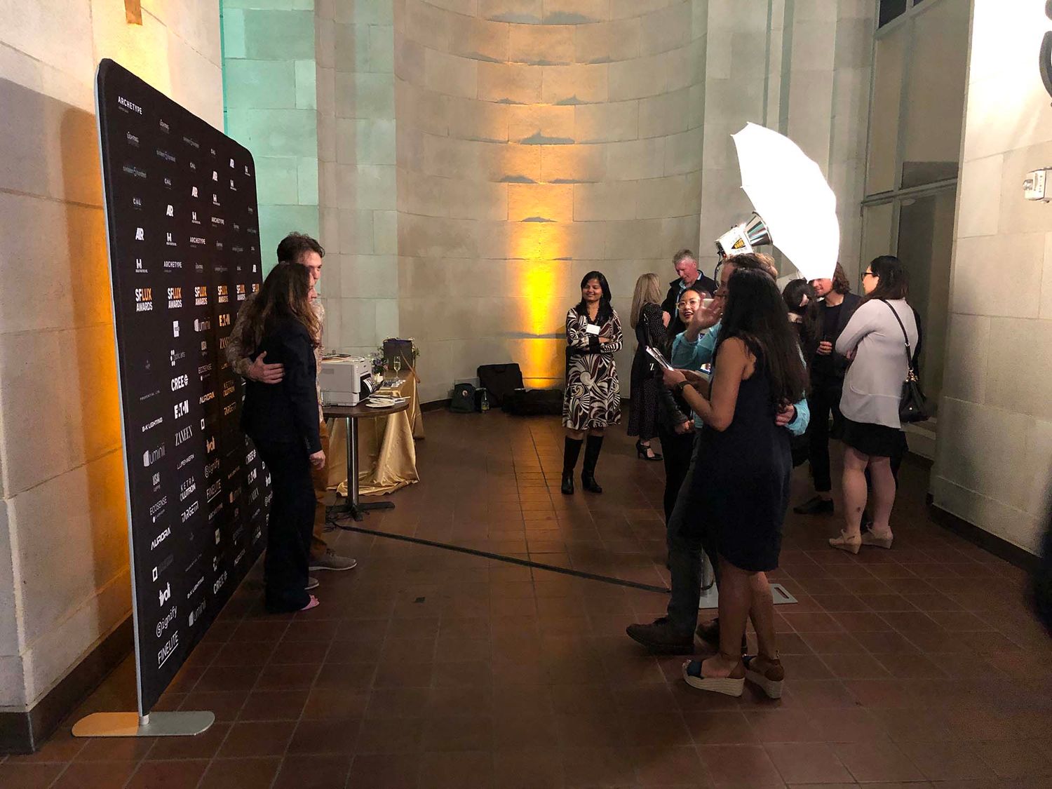 The AB800 was on full power with a +1/3 EC. We were positioned outdoors with very minimal lighting with the exception of the sconce on the upper right and event lighting.