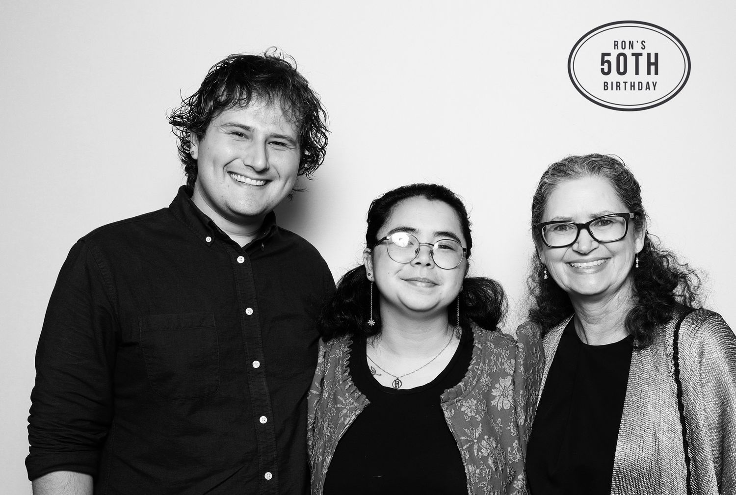 Black and white photo booth portrait with a woman wearing Filipiniana at a 50th birthday celebration party at Industrious in Walnut Creek.