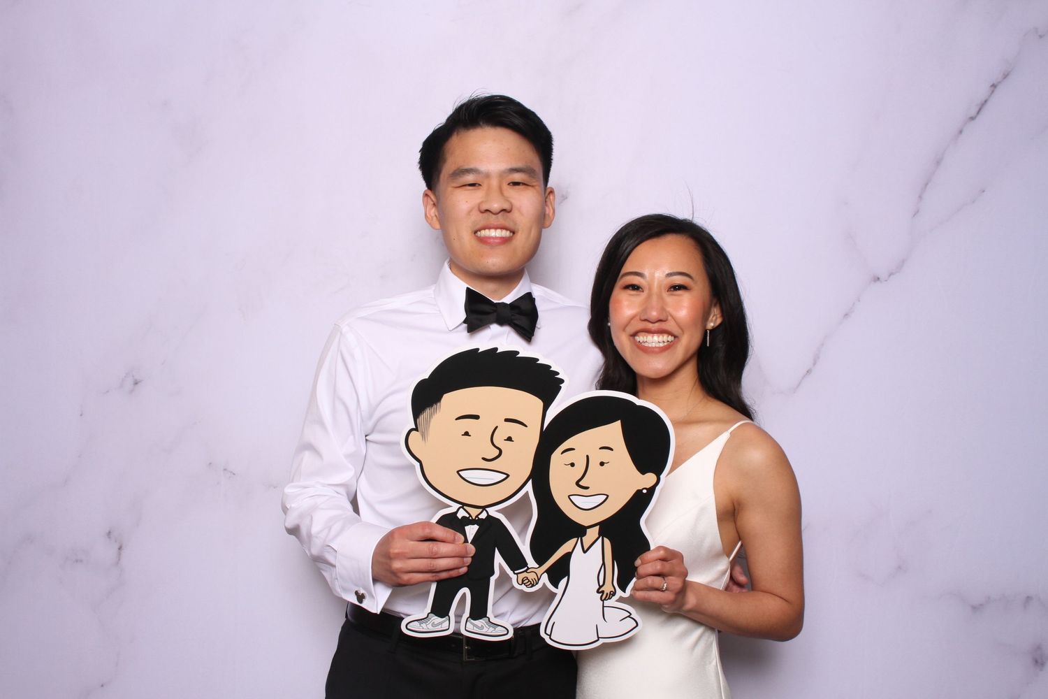 Couple posing at wedding photo booth at the Club at Ruby Hill in Pleasanton.
