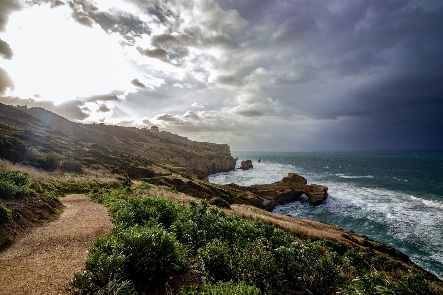 Dramatic skies at Tunnel beach