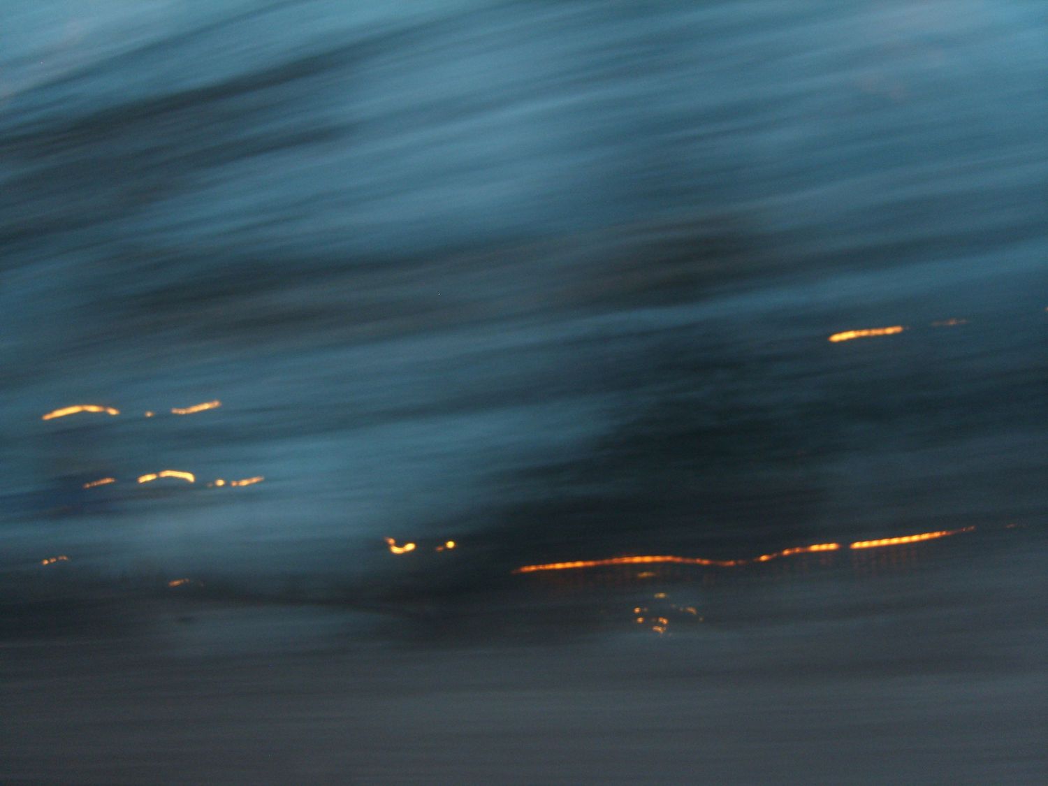 Textured blurred lights indicating movement by Cat Heygate Photo