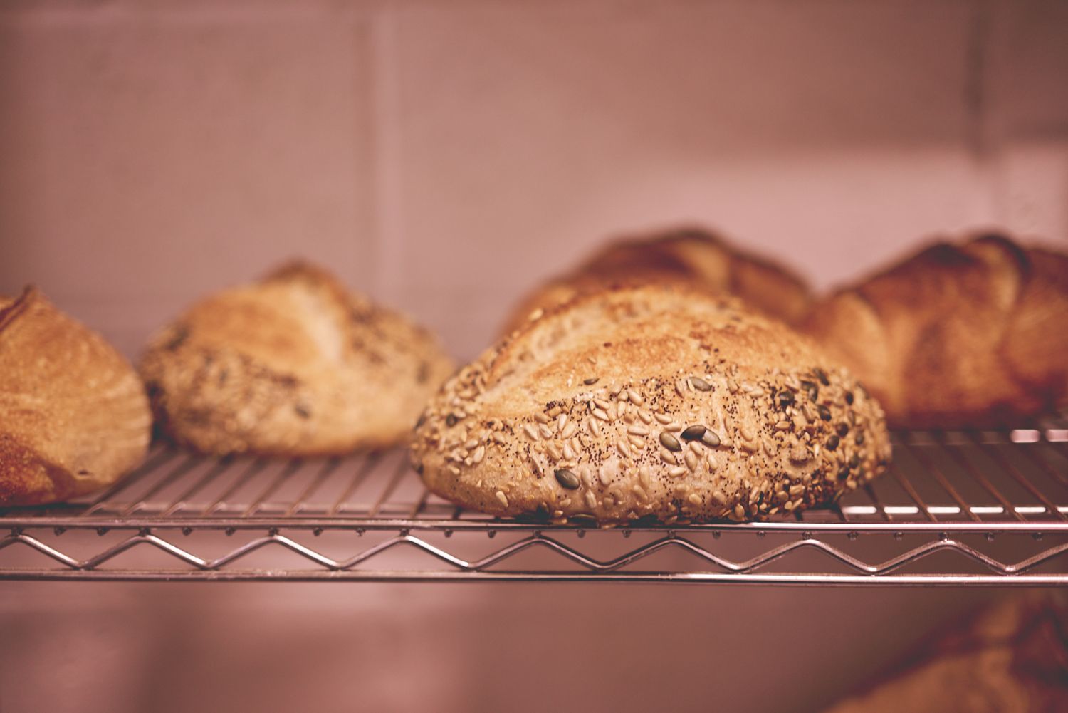 Sourdough fresh from the oven at a brand photoshoot for a Woodbridge baker