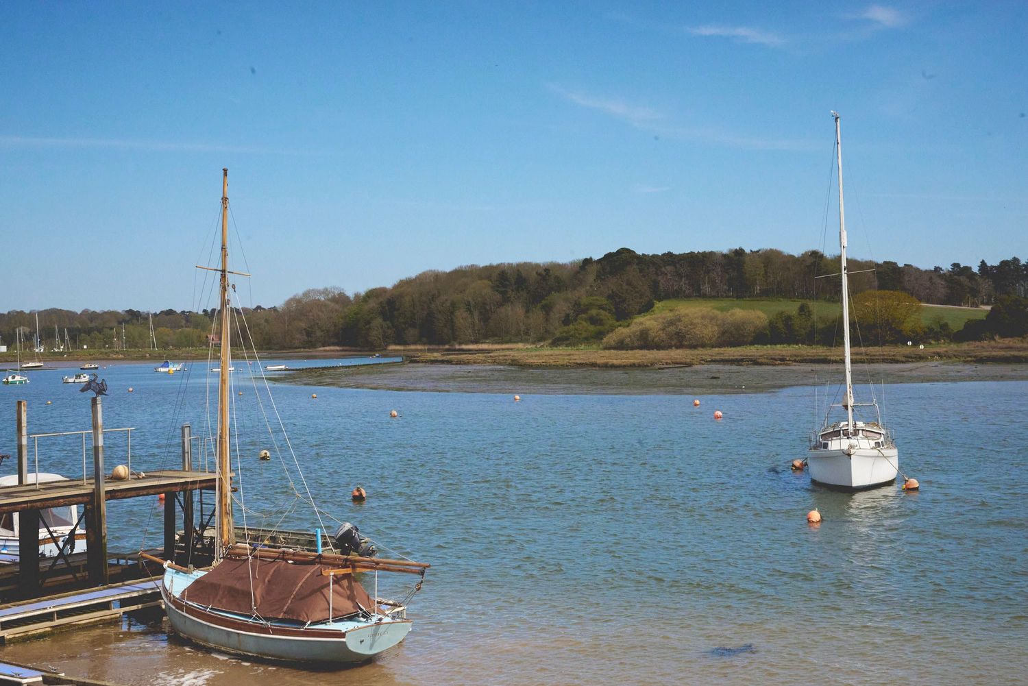 The River Deben on a sunny day with boats in Woodbridge.