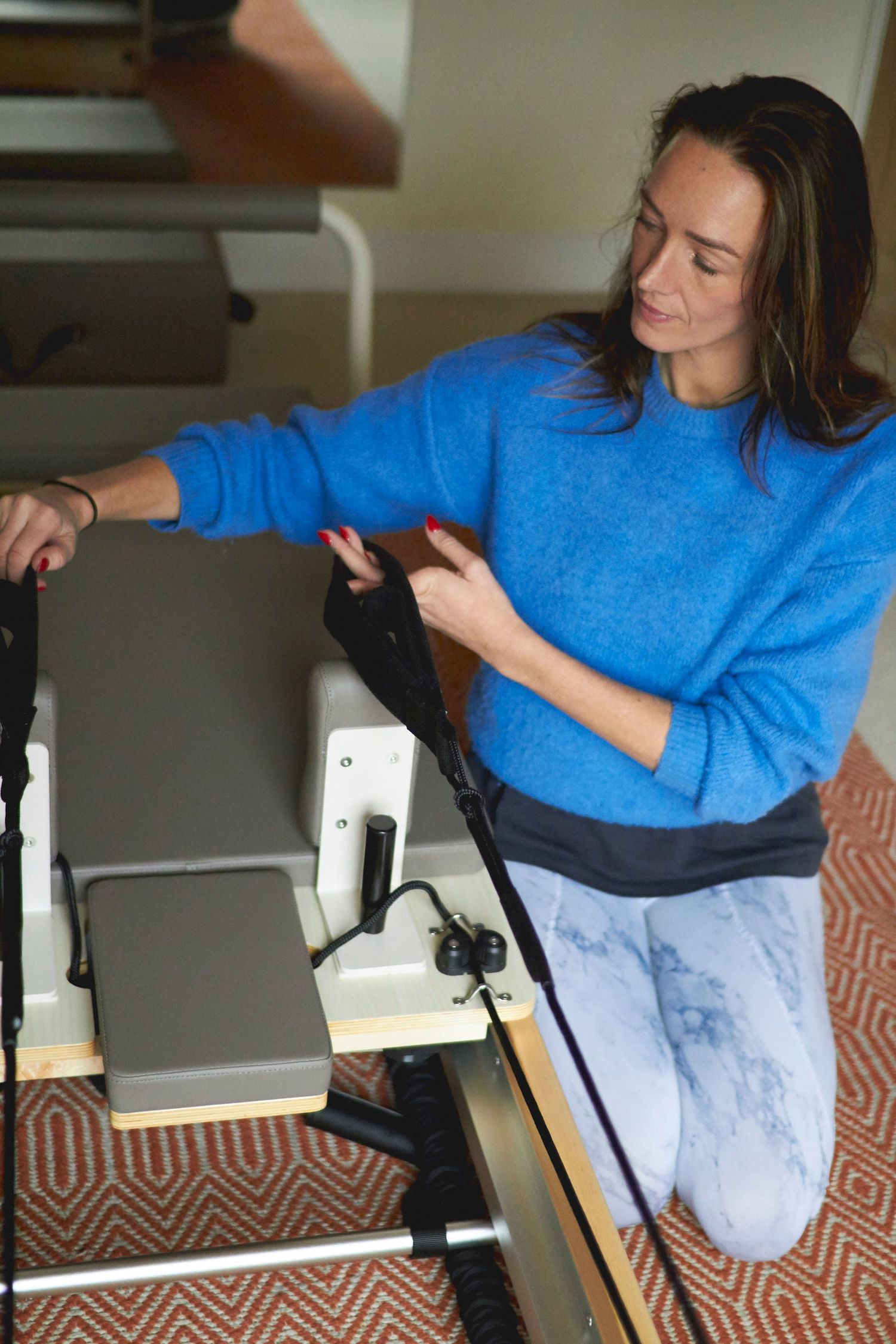 Bodykynd Pilates instructor working with a new Reformer at Albany Health in Woodbridge during a content refresh session