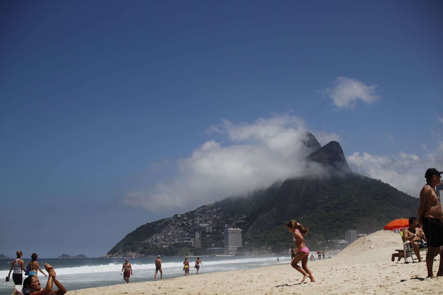 Ipanema Beach in sunlight candid Photo by Cat Heygate Photo