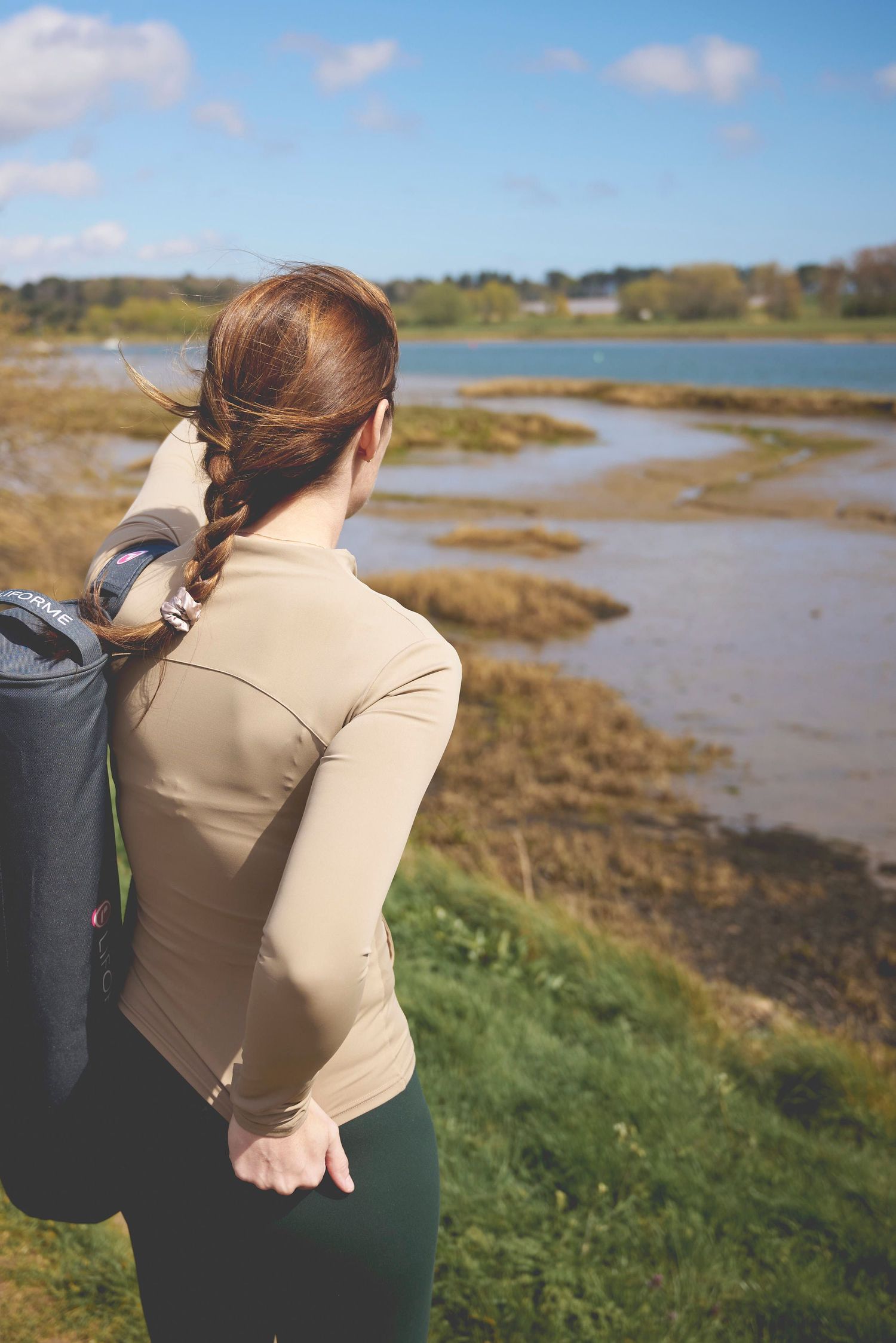 Pilates instructor overlooking the river deben during a brand photoshoot