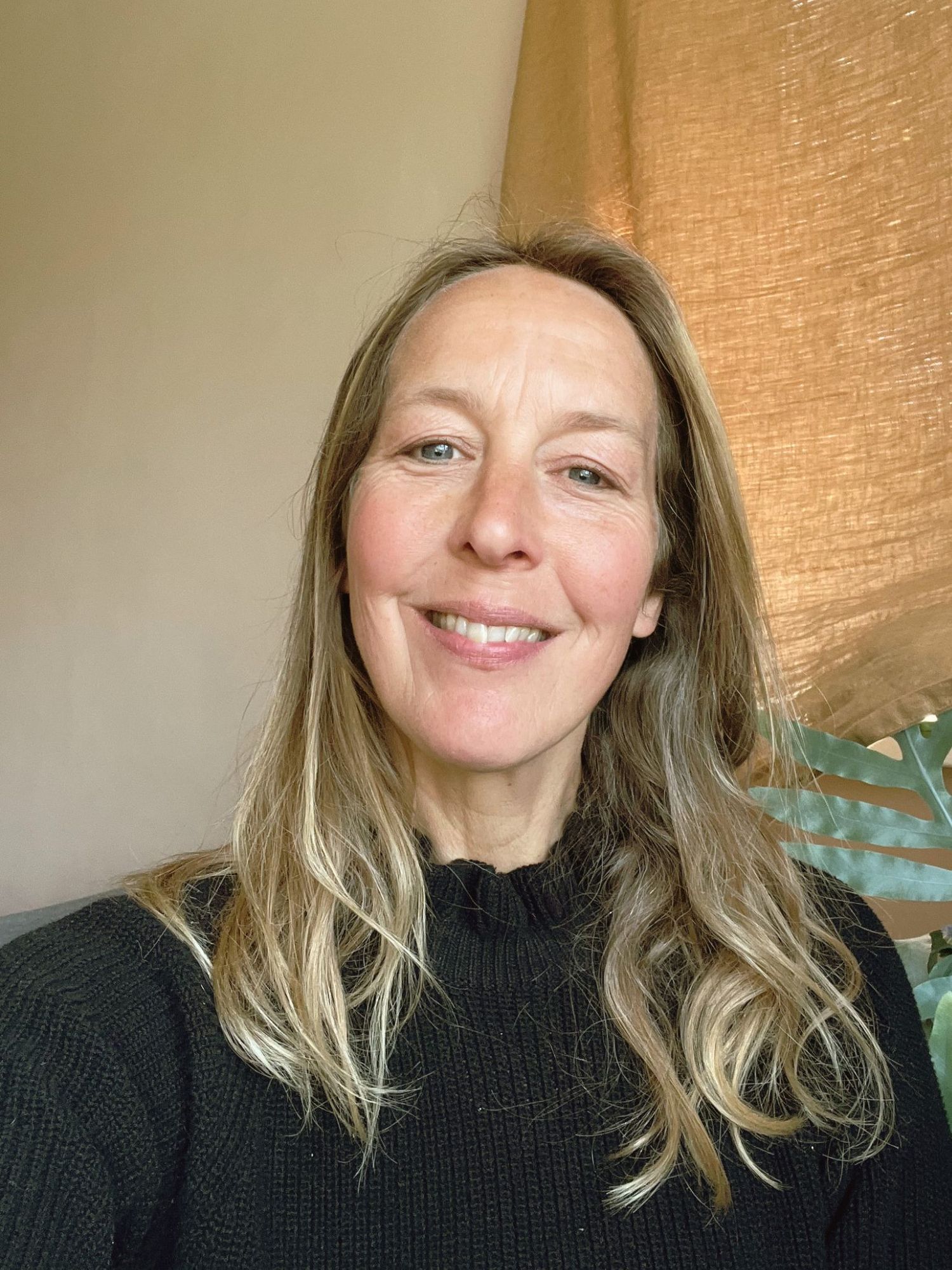 headshot of Suffolk natural brand photographer Cat Heygate Photo
